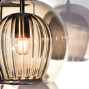 Glass globe pendant light over the island pendant lights