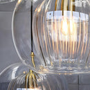 Glass globe pendant light over the island pendant lights